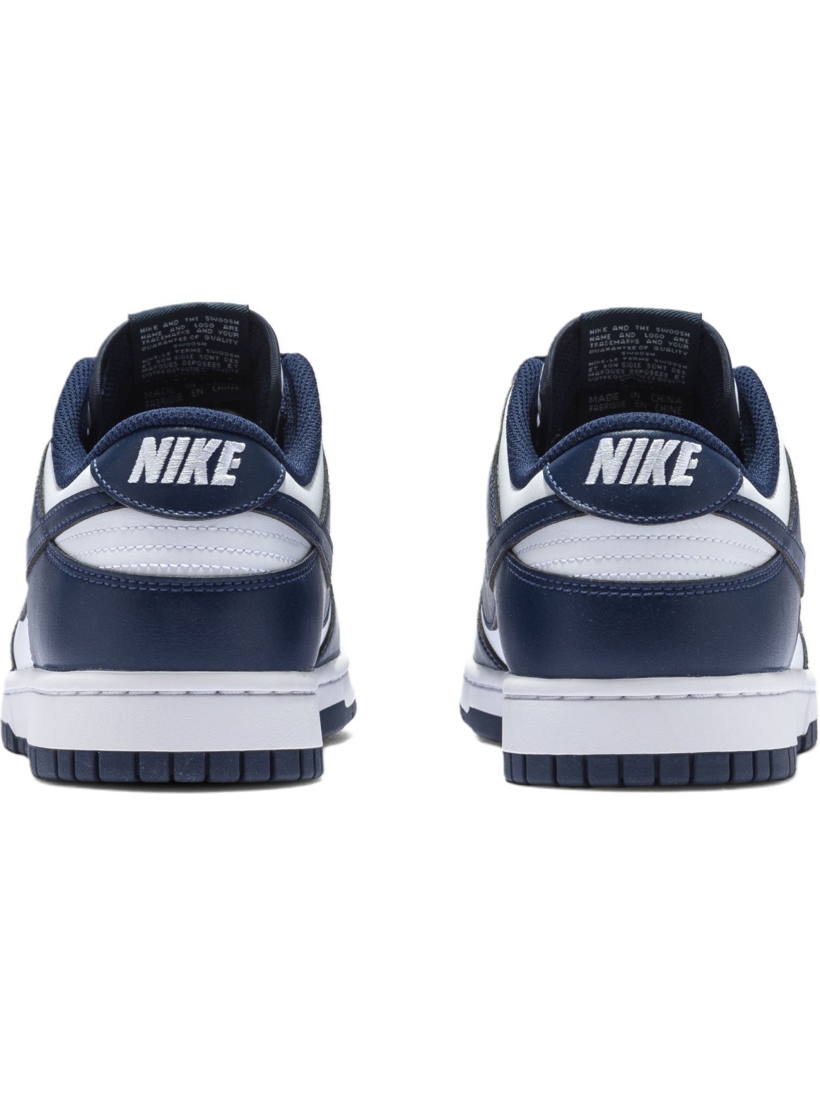 Imagem de: Tênis Nike Dunk Low Retro Branco e Azul Marinho