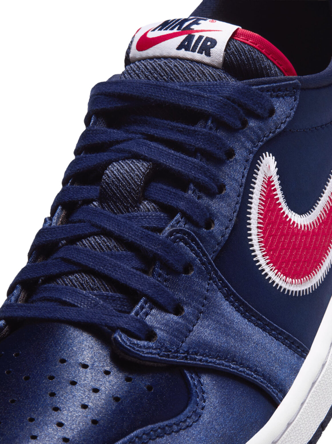 Imagem de: Tênis Jordan Air Jordan 1 Retro Low OG Azul Marinho e Vermelho